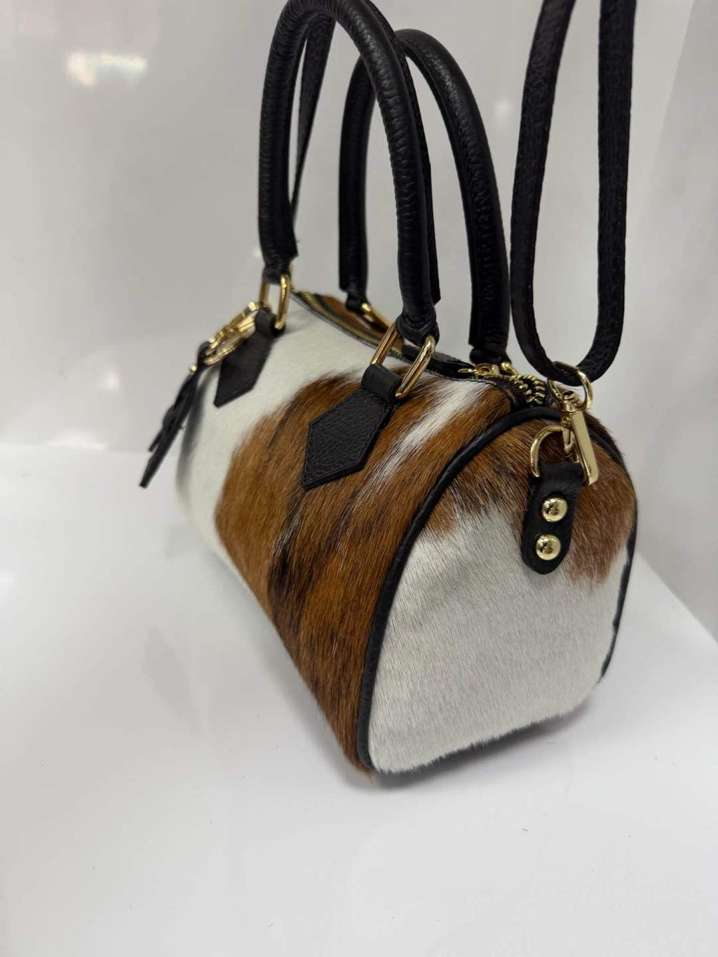ST135 Cow Print Pony Hair Barrel Bag