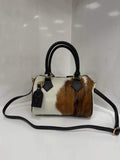 ST135 Cow Print Pony Hair Barrel Bag